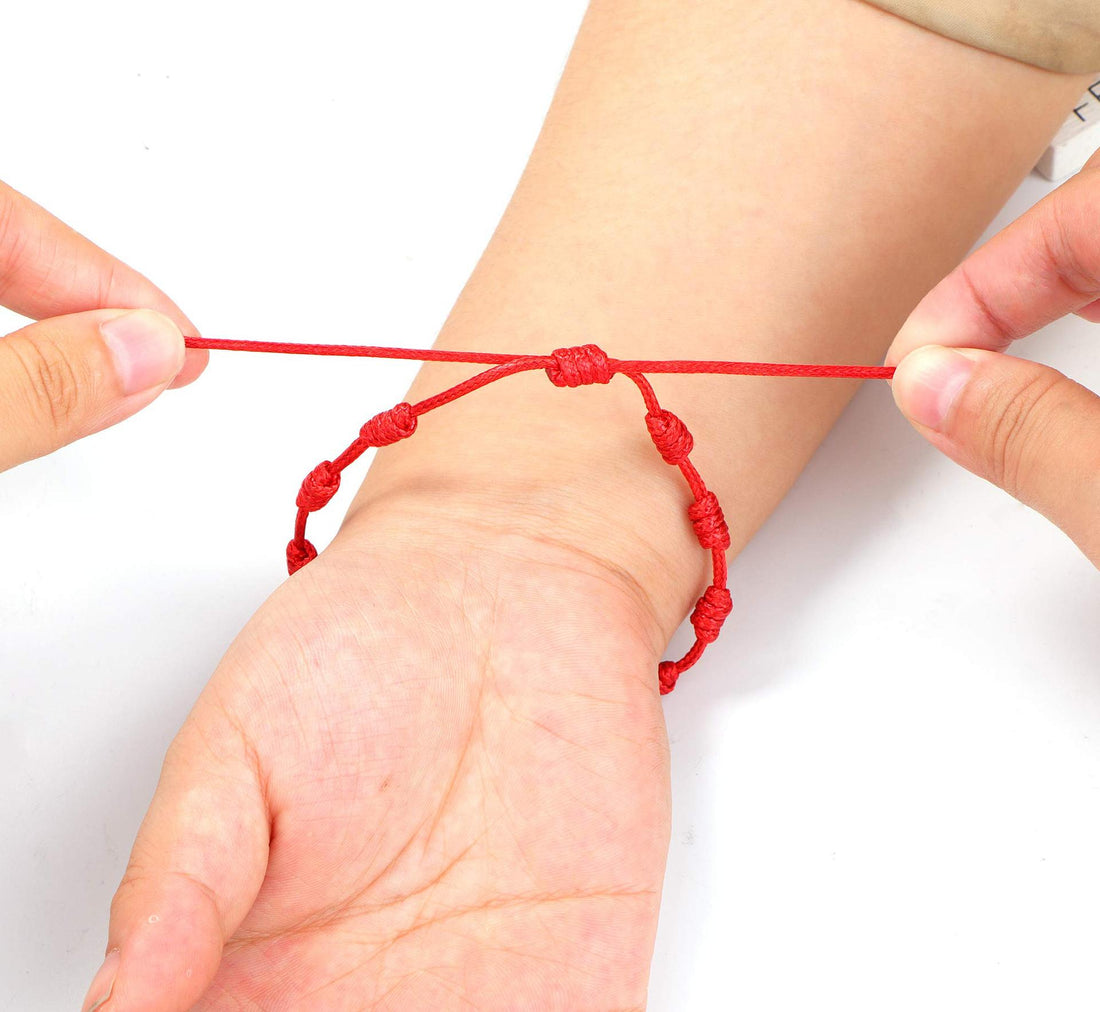 Pulsera 7 nudos roja